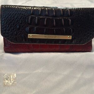 Brahmin tri fold red and black wallet!   
Truly loved!
